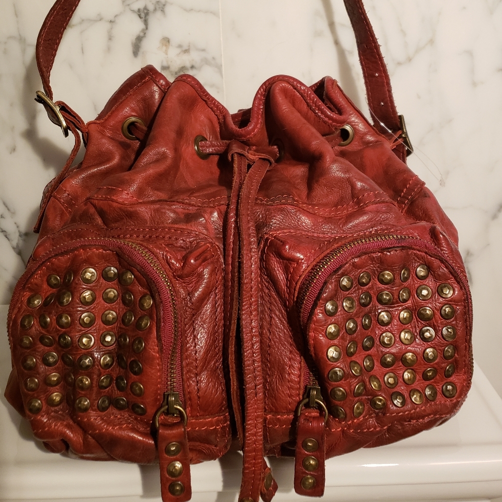 Frye Brooke drawstring red distress studded bag